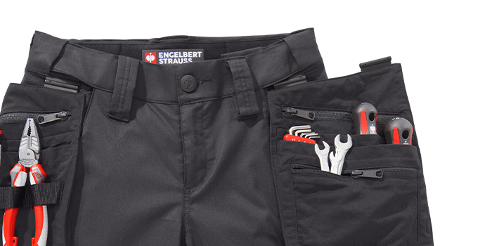 Werkzeugtasche e.s.concrete befestigt an der Bundhose e.s.concrete